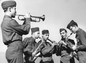 American soldiers playing musical instruments in U.S. service bands