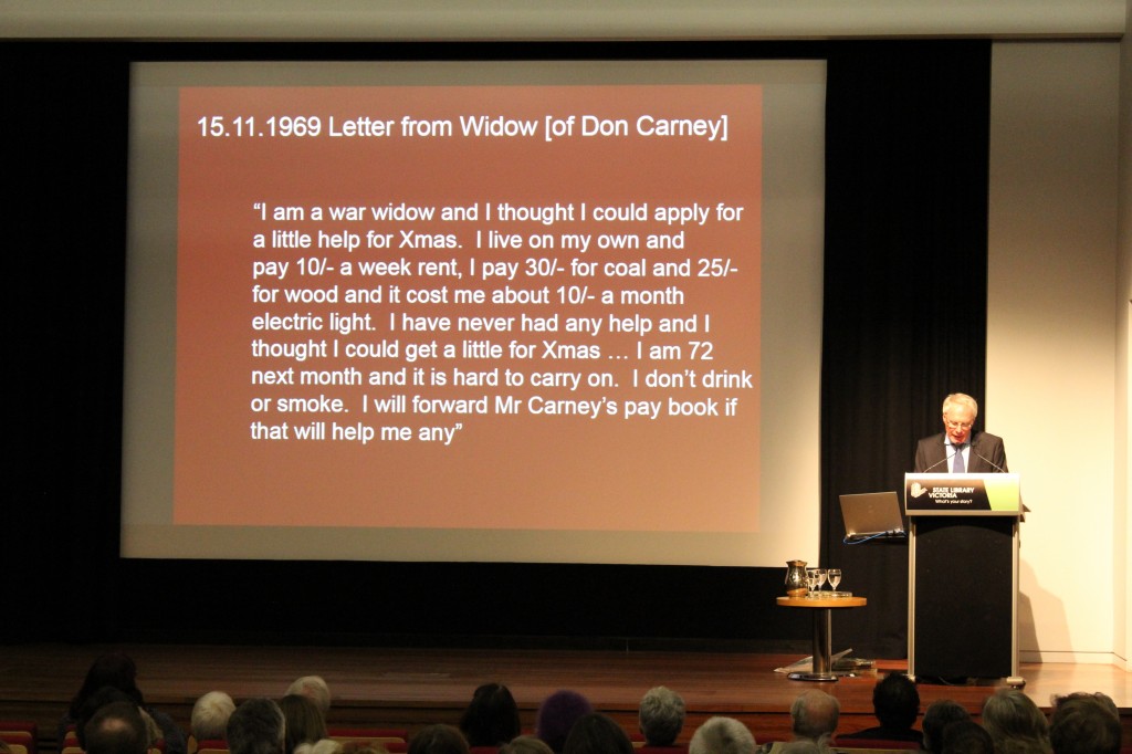 Professor Bruce Scates displays a letter from Don Carney's Widow, asking for financial assistance.
