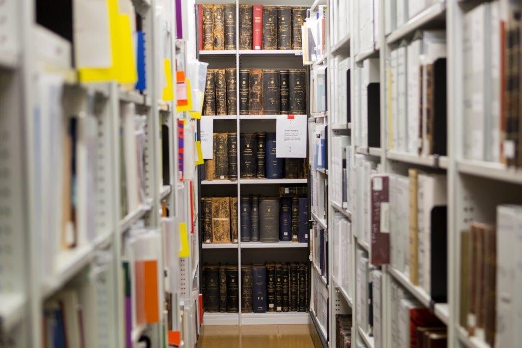 Image of the stacks full of books