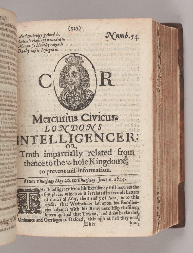 Inside page of a book featuring Charles I image