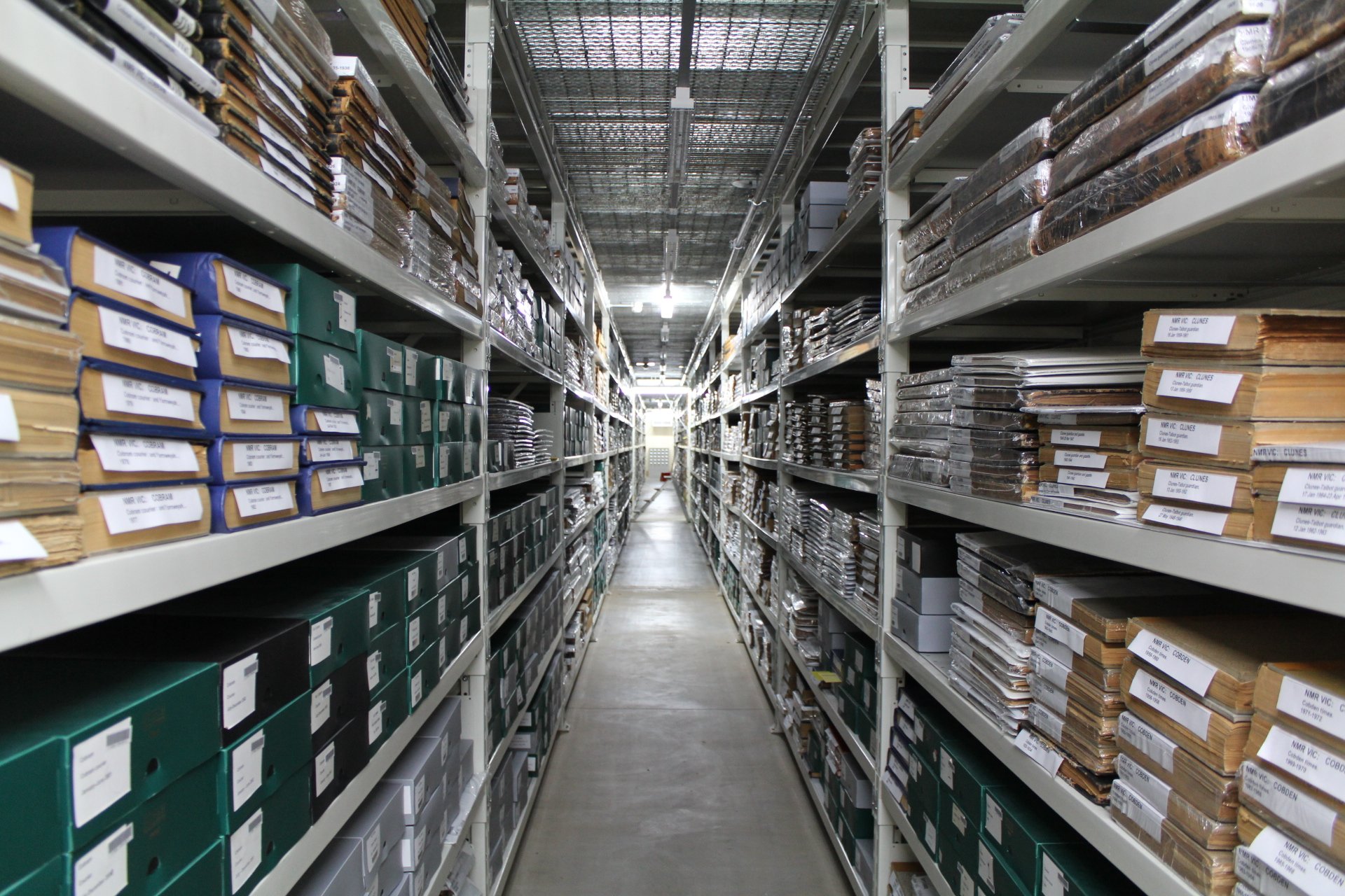 Rows of items in State Library Victoria's current storage facility.