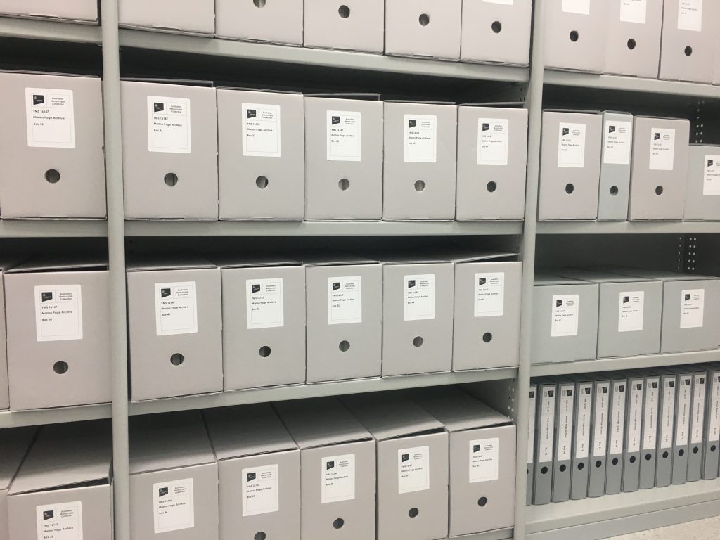 Shelving unit containing labelled archival boxes