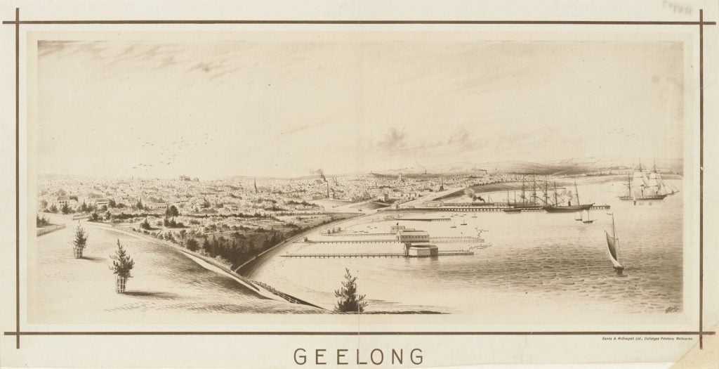 View across Corio Bay showing original sea baths and boats in the bay. 
