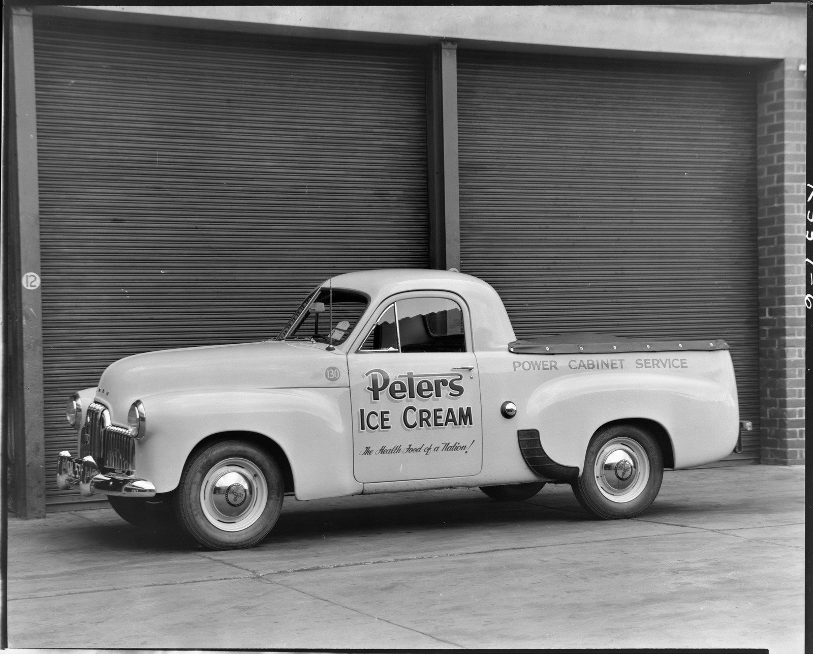Holden utility truck bearing Peters Ice cream logo