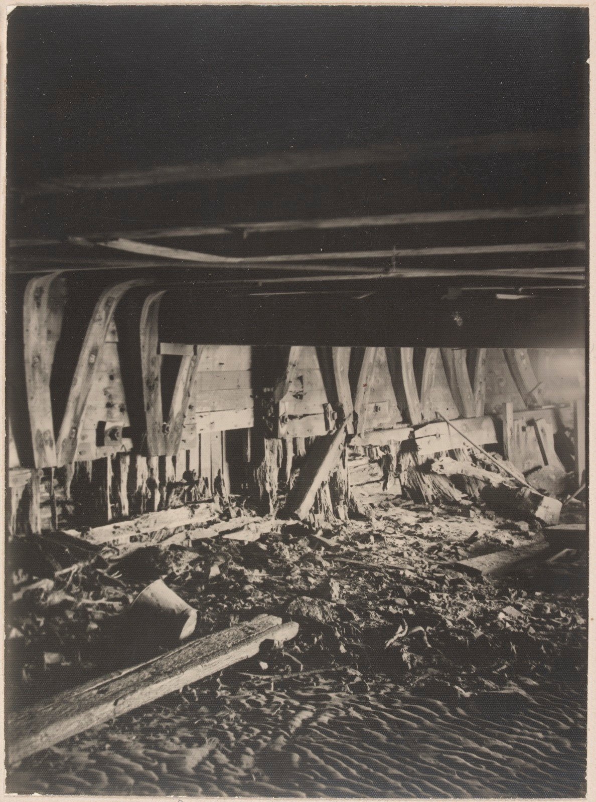Black and white photo showing the dilapidated interior of Captain Kenney's bathing ship before it was destroyed