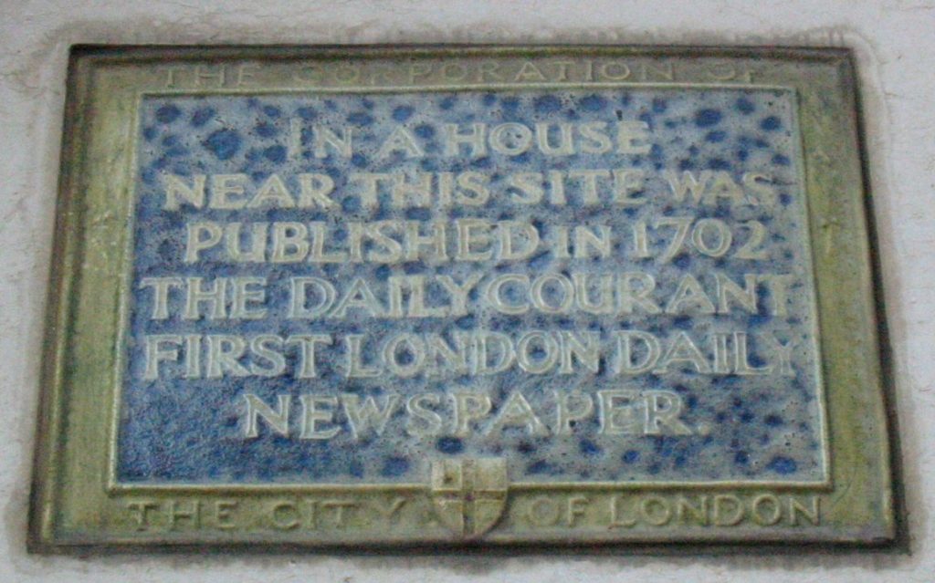 Photo of plaque in London that reads 'In a house near this site was published in 1702 The Daily Courant first London daily newspaper'
