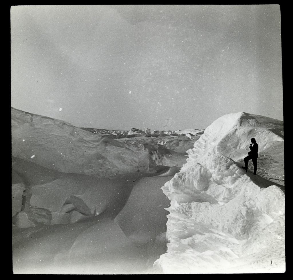 photograph of a view of wind blown snow formations, 