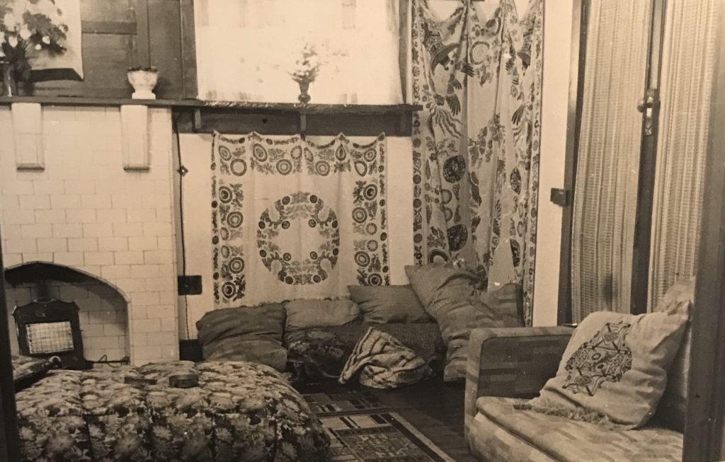 Room decorated with wall hangings, for a party, cushions on the floor