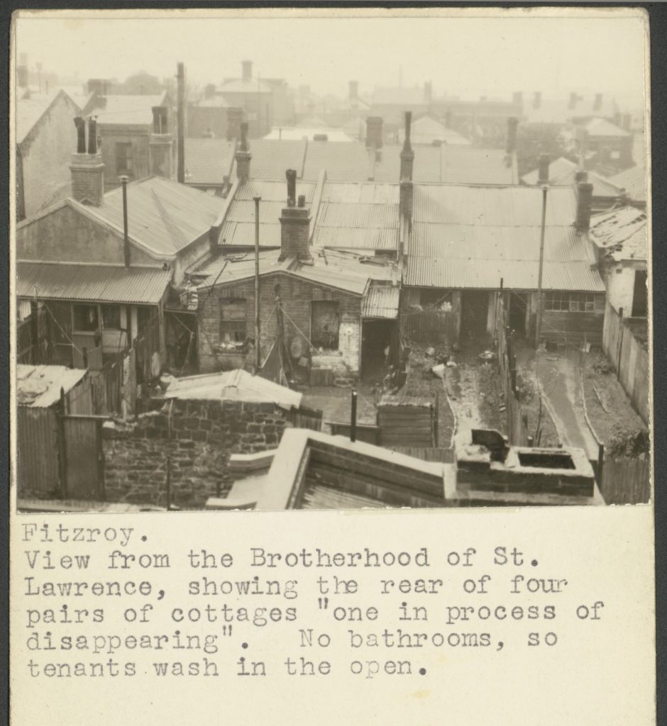Elevated photograph of the backyard areas of several cottages in the slum areas of Fitzroy. 