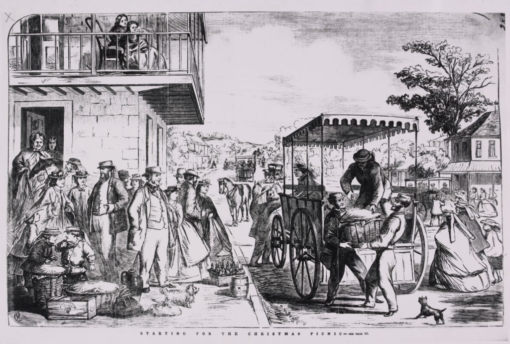 Photo of engraving from 1865 showing men loading hampers for a picnic onto a horse-drawn cart. A crowd of people watches. 