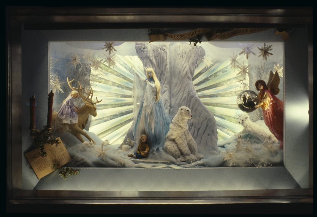 Colour image of Snow Queen scene from a Myer Christmas window, showing an artic landscape with the Snow Queen and a polar bear.