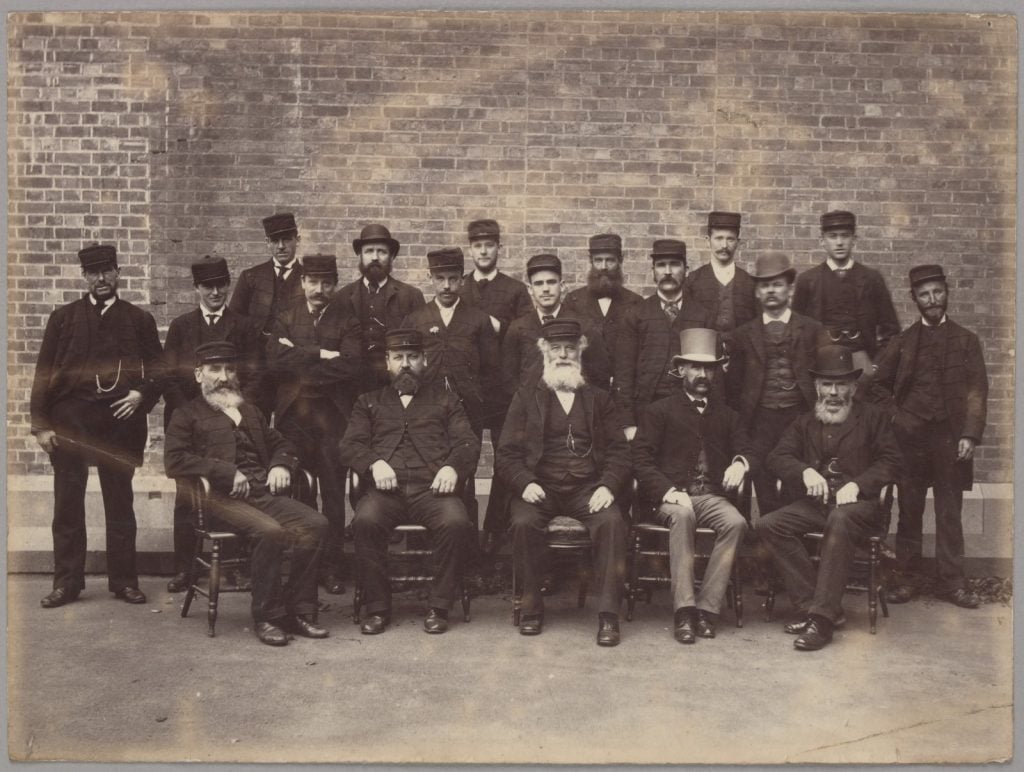 Group portrait of library and gallery attendants from ca. 1890