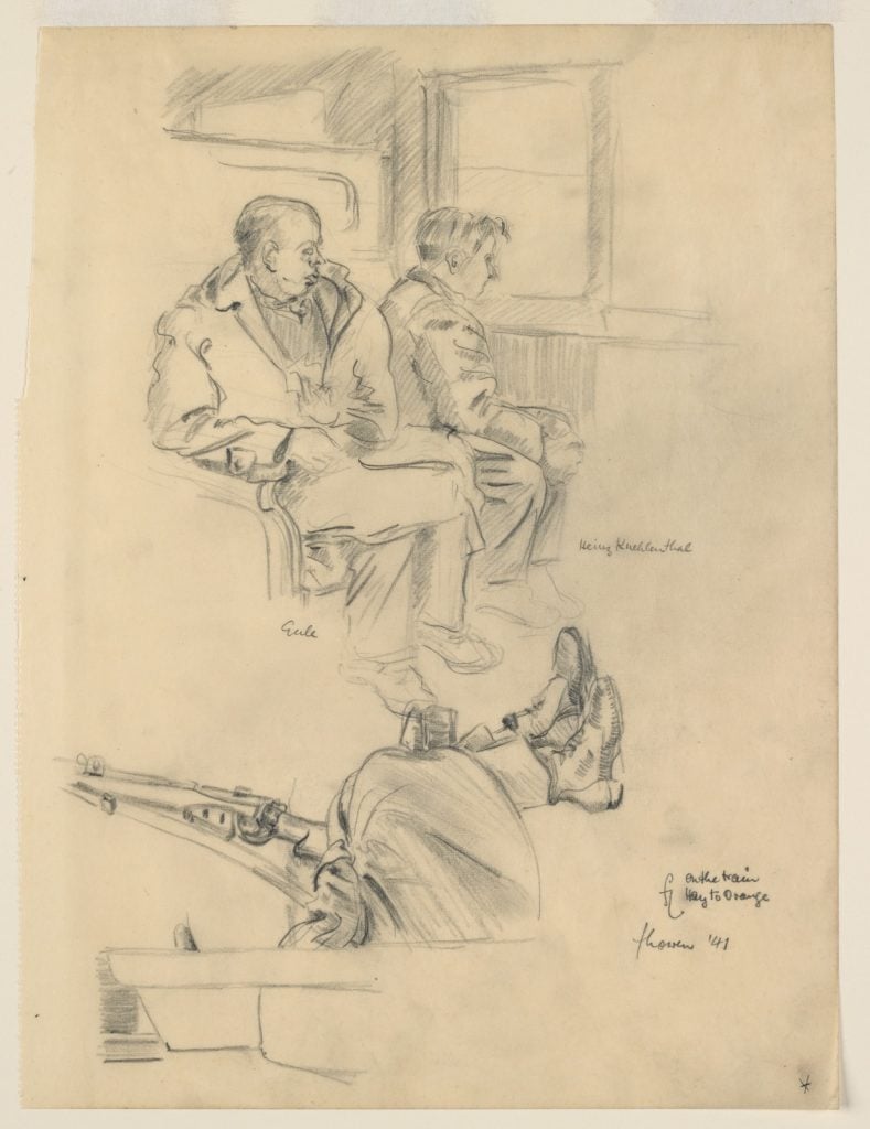 passengers on the train from hay to Orange - 2 men sitting in a carriage with the feet of a soldier in view, cradling a rifle on his knees