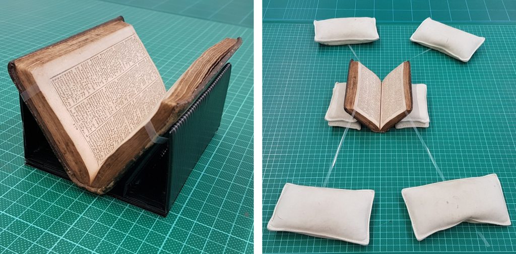 Examples of a book cradle and map weight support system 