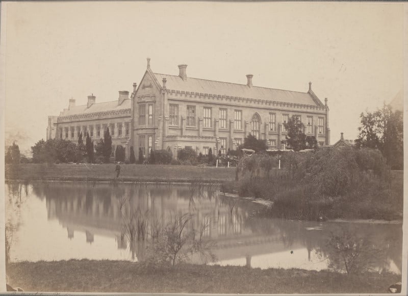 Melbourne University, large, gothic building with large pond in front