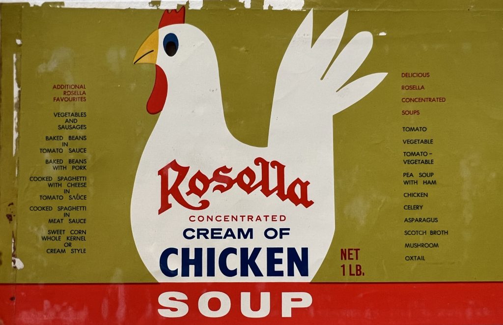 A label from a can of cream of chicken soup with a stylised design. 