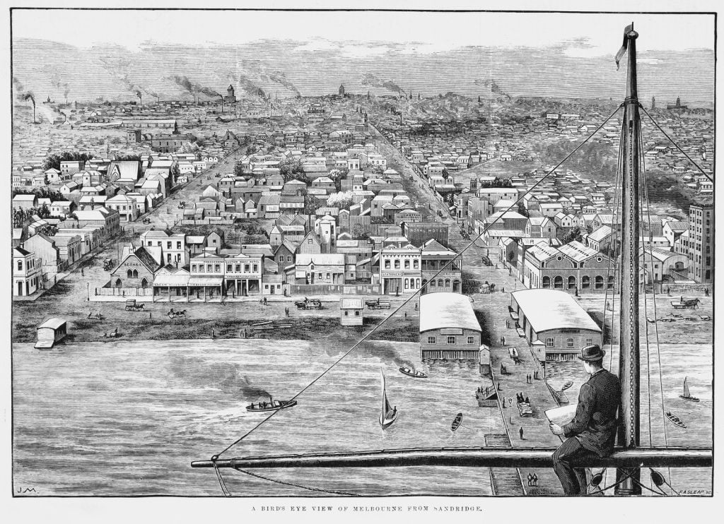 Black and white illustration featuring birds eye view of houses in Sandridge. There is a man sitting on top of a boat sail in foreground looking out over the view