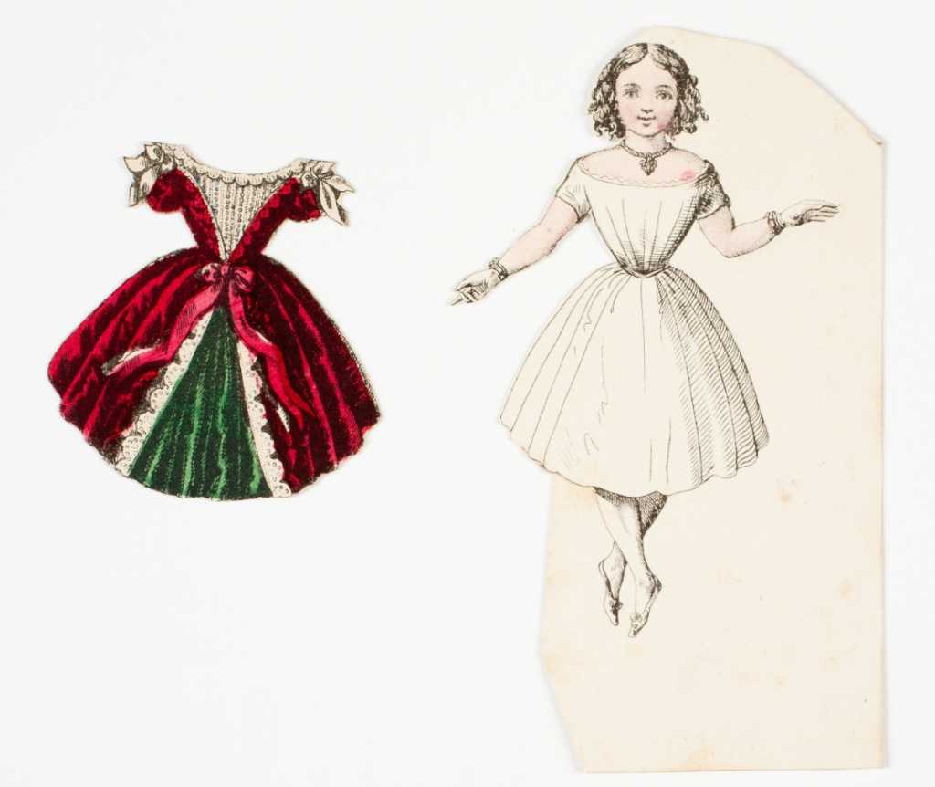 Paper doll, with two images. The right is a caucasian young woman wearing a beige petticoat and slippers, with ringlets in her hair. The left is an 1850s dress of a size to fit the woman, with red overlay, a green underskirt and a red bow at the waist.