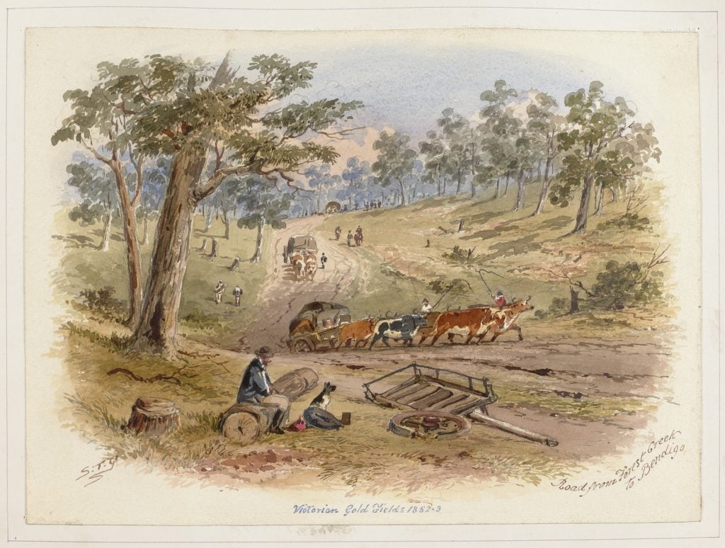  Elevated view of unmade road through countryside, showing men driving ox teams hauling supplies and diggers walking the track on the way to the gold fields of Bendigo, in the left foreground a digger is seated on a log with his dog beside him, an unpoled cart and a broken wheel lying nearby.