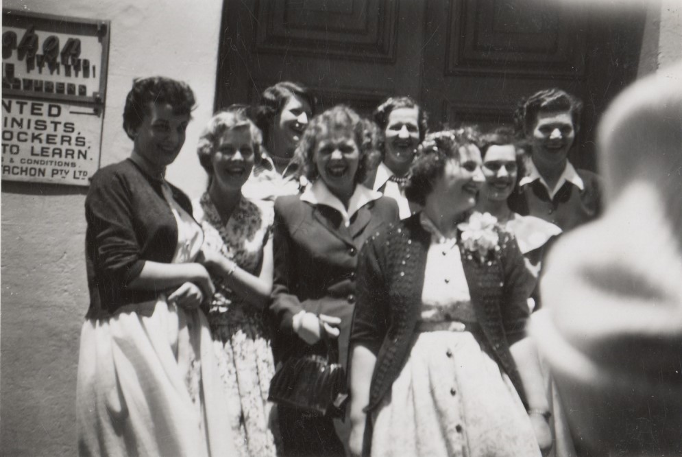 Group of women outside factory