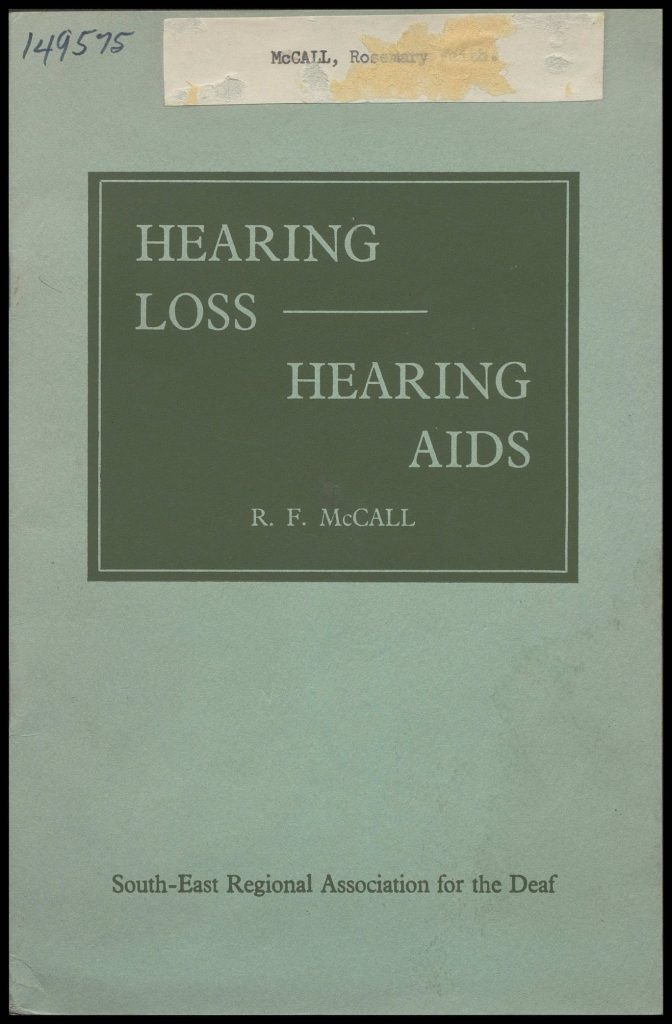 Green book cover. Title reads: 'Hearing Loss. Hearing Aids.'