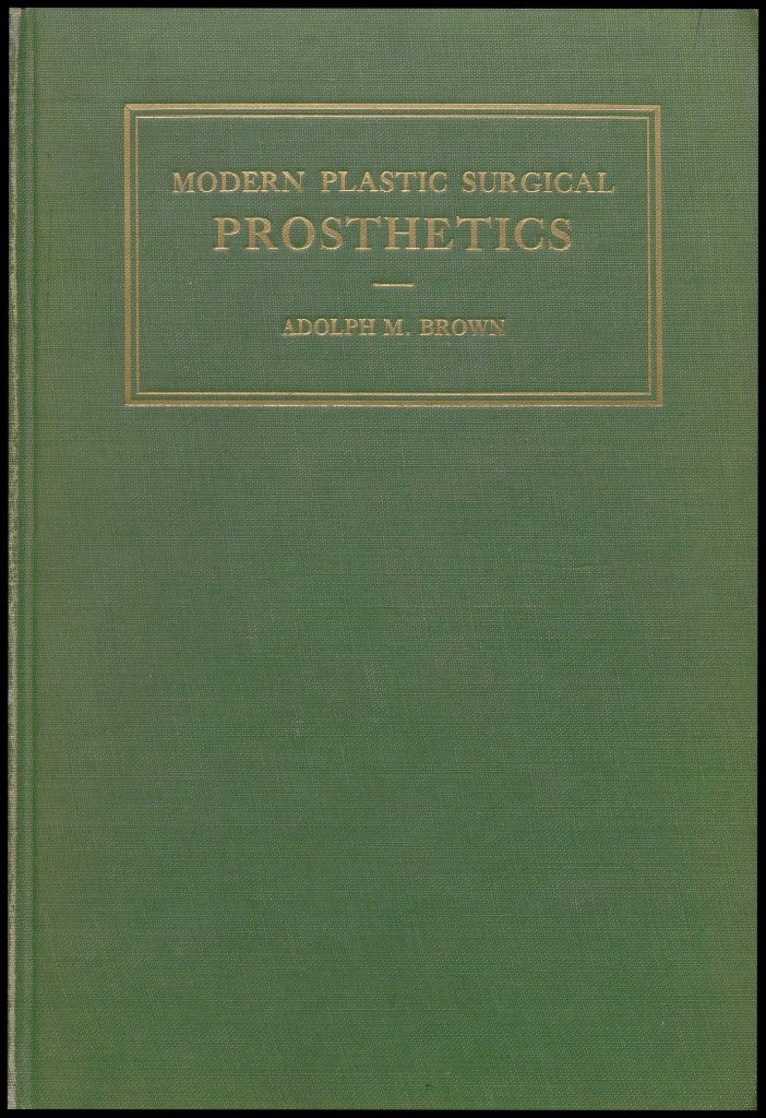 Green book cover. Title reads: 'Modern plastic surgical prosthetics.'