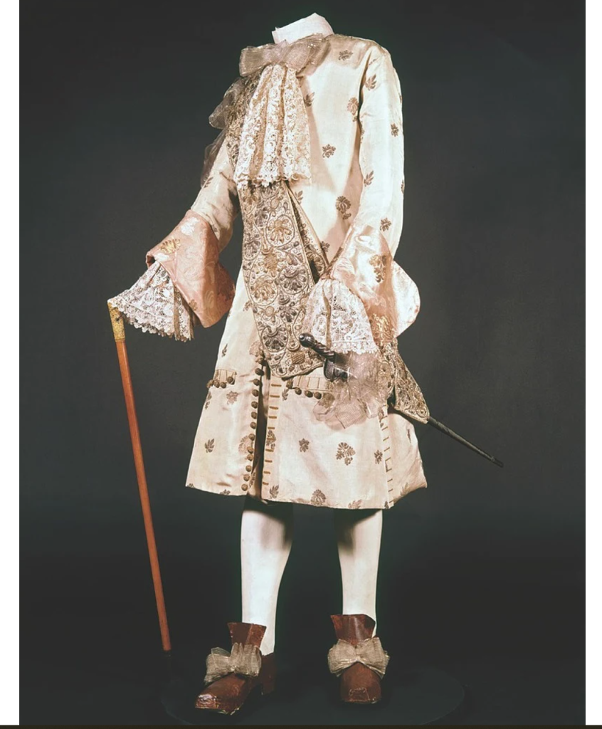 Costume made for the wedding of Sir Thomas Isham in 1681. Men’s outer coats had lengthened to the extent that they hid the knee-breeches beneath.