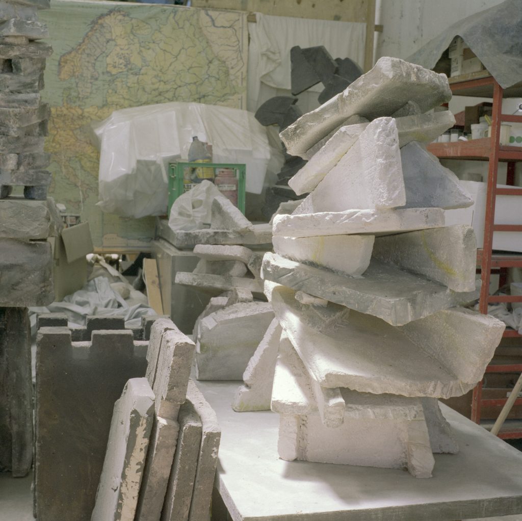 A photo of the material used by Mark Stoner to create his artwork including a large pile of stone