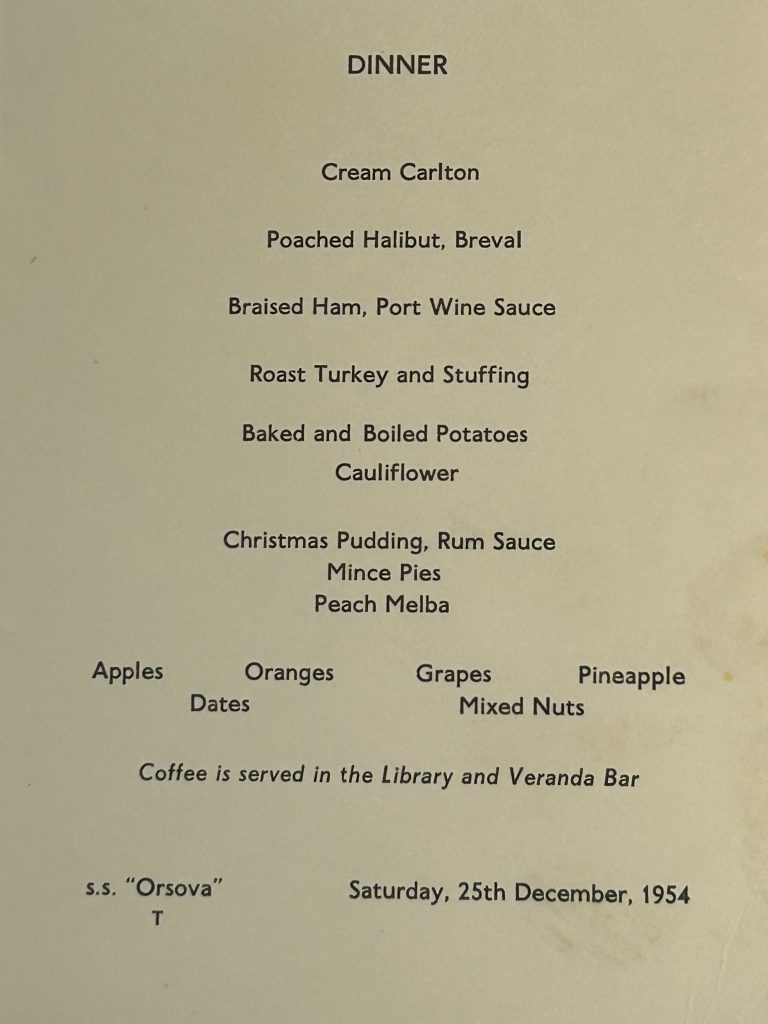 Typed menu listing Christmas dishes.