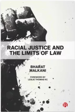Cover image of Racial justice and the limits of law showing a black and white image of a raised fist.