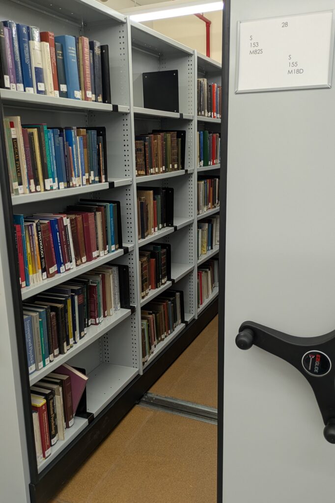 Photograph of an open library compactus