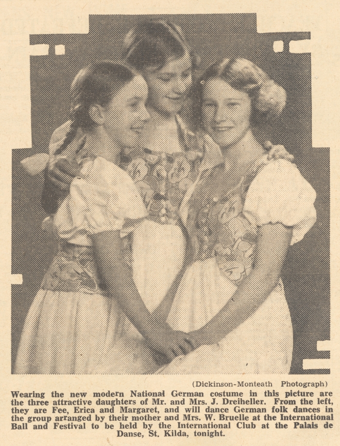 photograph from a newspaper of three sisters in traditional German costumes